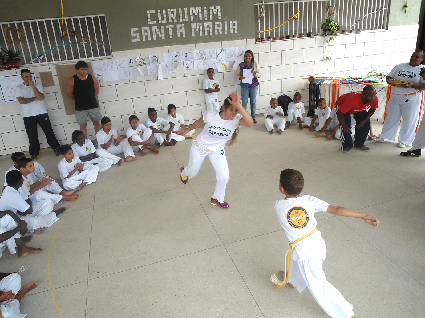 Portal de Notcias PJF | Aulo de Capoeira rene 65 crianas e adolescentes no Curumim Santa Maria | SDS - 22/10/2014